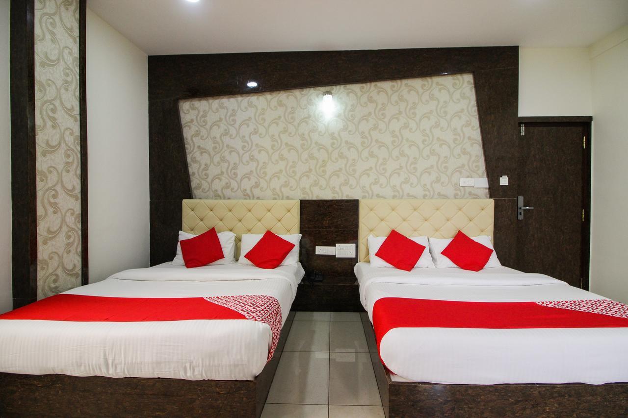 โอโย 15136 นิสรรค์ ลอดจ์ Hotel จิกมากาลูร์ ภายนอก รูปภาพ
